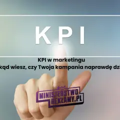 Palec wskazuje na przycisk z napisem "KPI". Czy wiesz, co to KPI w marketingu i jak mierzyć sukces kampanii?